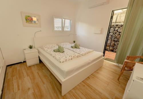 Postel nebo postele na pokoji v ubytování Casa Simón