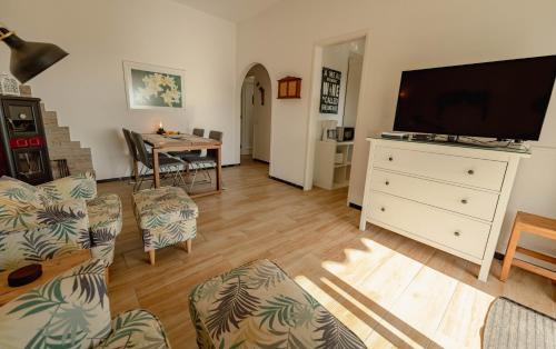 TV a/nebo společenská místnost v ubytování Casa Simón
