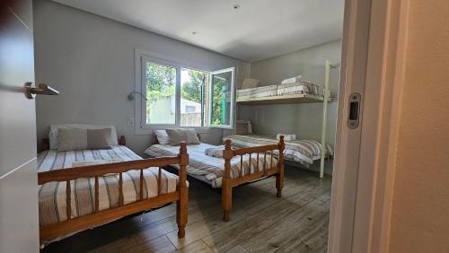 Postel nebo postele na pokoji v ubytování Casa Lekutxoa con amplio jardín cerca de San Sebastián