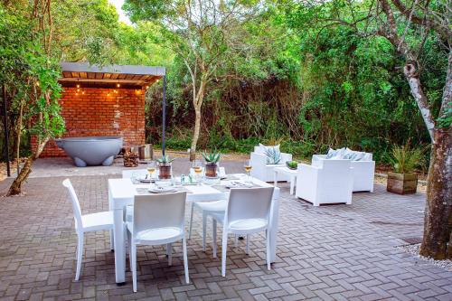 Κήπος έξω από το The Soirée Exclusive Residence