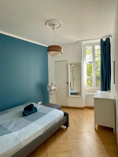 Postel nebo postele na pokoji v ubytování LE CLOS DE SAINT JO - Dijon centre T3