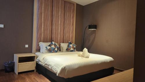 Ένα ή περισσότερα κρεβάτια σε δωμάτιο στο My Misto Homestay, Riverson Soho