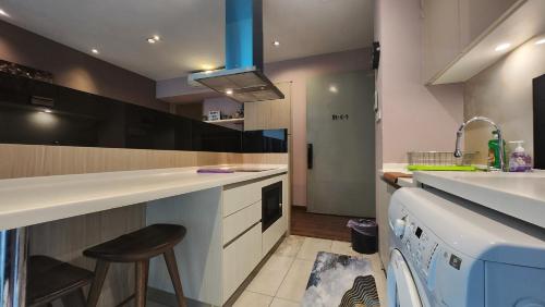 Η κουζίνα ή μικρή κουζίνα στο My Misto Homestay, Riverson Soho