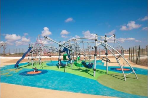 an empty playground with a roller coaster at Ocean Park Zenata City Eco in Casablanca