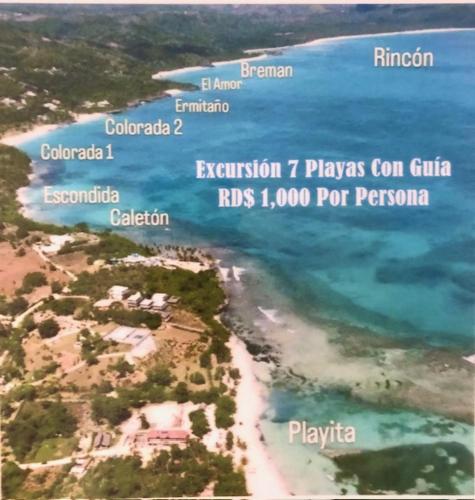 an aerial view of a beach and the ocean at Villa KAMBUSA in Las Galeras