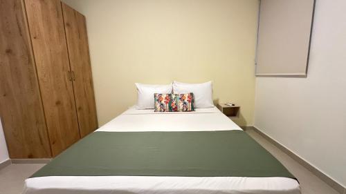Hotel Taybo Kai By St Hotelesにあるベッド
