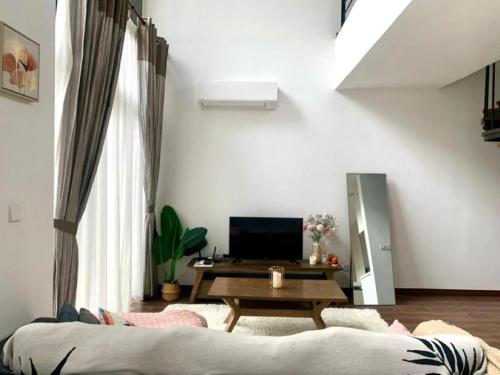 Μια τηλεόραση ή/και κέντρο ψυχαγωγίας στο My Misto Homestay, Riverson Soho