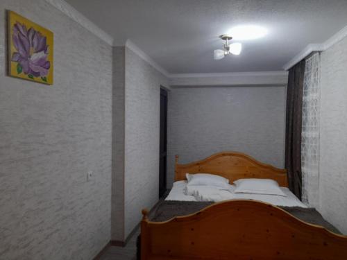 Postel nebo postele na pokoji v ubytování Gest House Mariami