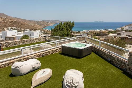 Gallery image of Magnificent Mykonos Apartment Apartment Nexus 2 Bedrooms Private Terrace With Jacuzzi Outdoor Dining Area & Bbq Kalafatis in Kalafatis