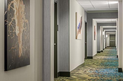 a corridor of a hospital hallway with a carpeted floor at Hotel 43 Boise in Boise