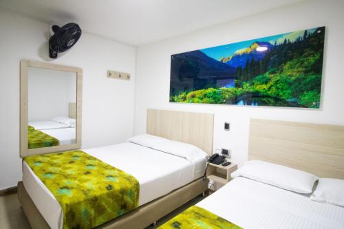 Postel nebo postele na pokoji v ubytování Hotel Boutique Street 50