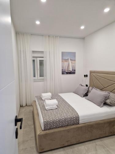 Posteľ alebo postele v izbe v ubytovaní Lavanda Centar Makarska