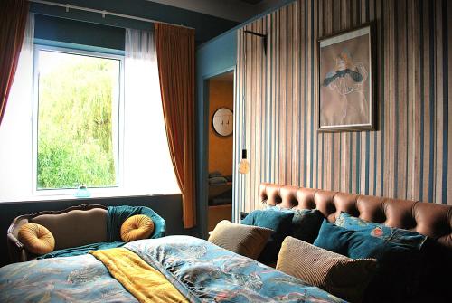 Postel nebo postele na pokoji v ubytování B&B La Sucrerie
