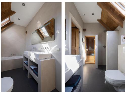 a bathroom with two sinks and a toilet at Gastenverblijf Prinsensteeg in Nieuwleusen