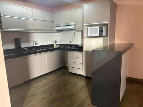 Küche/Küchenzeile in der Unterkunft Residencial AMB