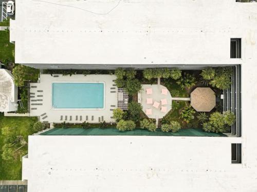 an overhead view of a building with a pool at Delightful 1BR Condo Next to Disney With Lake view in Vineland
