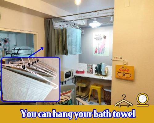 a room with a birth room with a table and a room with a birth room at Nice Day Motomachi in Kobe