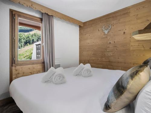 Postel nebo postele na pokoji v ubytování Grand appartement ski in/ski out pour 10 pers. à Saint Martin de Belleville, WiFi, balcon - FR-1-570-63