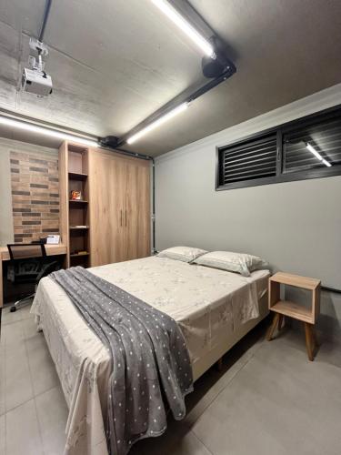 Ένα ή περισσότερα κρεβάτια σε δωμάτιο στο Loft Recanto de Beija