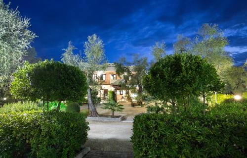 Κήπος έξω από το Residence Valleverde