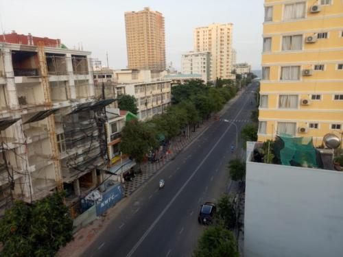 a view of a city street with tall buildings at Nam Hải Hotel in Vung Tau