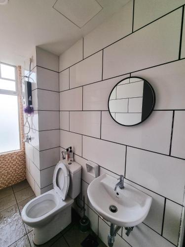 Ένα μπάνιο στο Taiping Centre Point Suite 7 by BWC