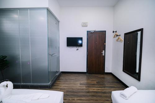 Katil atau katil-katil dalam bilik di Swing & Pillows - Kota Kemuning Selangor