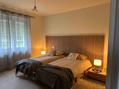 Llit o llits en una habitació de Maison Matisse