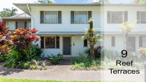a house with the words real terraces at 9 Reef Terraces Port Douglas in Port Douglas