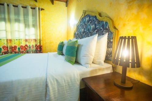 Una cama o camas en una habitación de Villa Carla