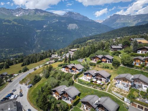 an aerial view of a village in the mountains at Cabane de la Delege -Crans Montana- Amazing Views in Crans-Montana