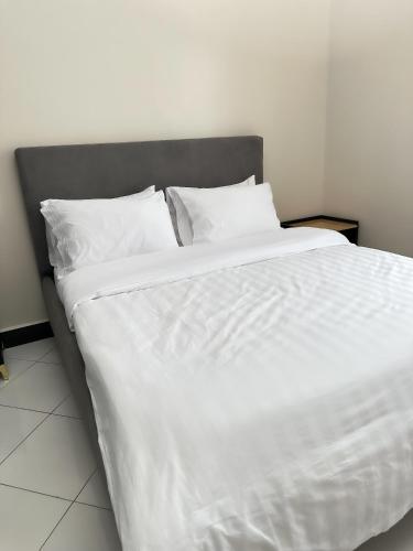 Ένα ή περισσότερα κρεβάτια σε δωμάτιο στο LivLux Apartments 5