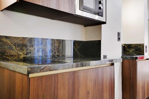 Photo de la galerie de l'établissement Cozy studio - 2P - Place des Vosges-Marais, à Paris