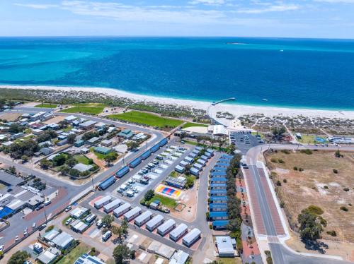 an aerial view of a parking lot next to the ocean at Jurien Bay Tourist Park in Jurien Bay