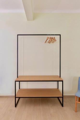 a shelf in a room with a wall at Bed and Breakfast Casa Castelli - ospitalità e vino in Falerone