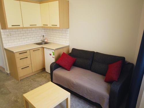 Kuchyň nebo kuchyňský kout v ubytování M2 Hotel