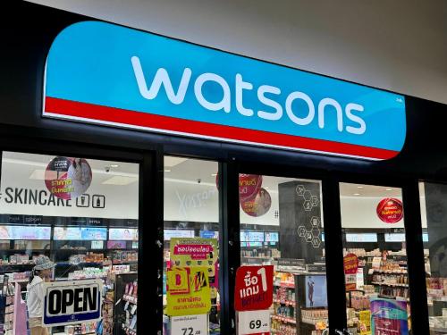 a sign for a wissons store in a store at Sriracha Avenue Serviced Apartment in Si Racha