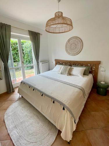 Postel nebo postele na pokoji v ubytování Le Lantane House
