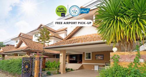 a tree approval pick up sign in front of a house at Orchid Pool Villa Phuket - SHA Extra Plus in Phuket Town