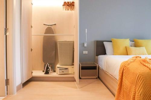 Postel nebo postele na pokoji v ubytování Cassia Residences Sea View