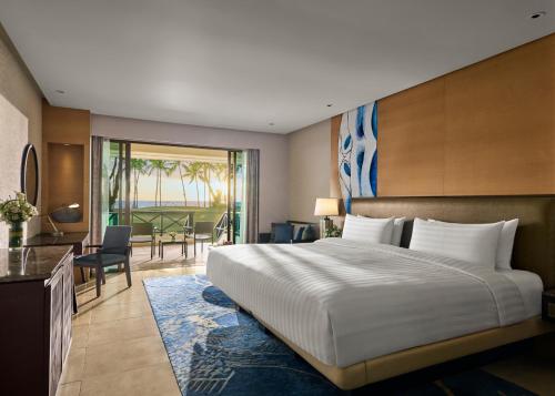 Postel nebo postele na pokoji v ubytování Shangri-La Tanjung Aru, Kota Kinabalu
