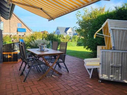 Fotografie z fotogalerie ubytování Ferienhaus Urlaub am Meer mit Terrasse, Balkon und großem Garten v destinaci Tating