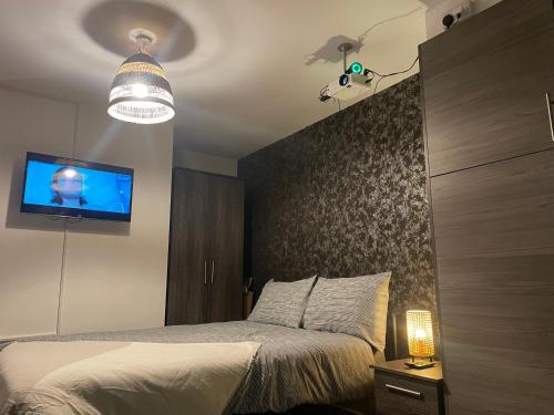 Postel nebo postele na pokoji v ubytování L1 Luxury Living