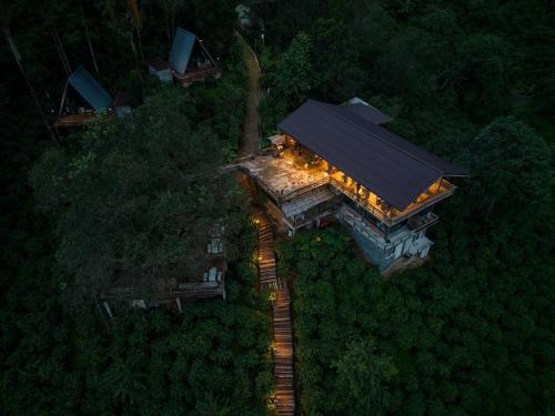 an overhead view of a building with lights on it at Ma Family Coffee Farm ไร่กาแฟครอบครัวมะ in Ban Huai Pong Nam Ron