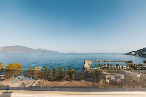 a view of a large body of water with trees at Mazarine Hotel, Vlorë, Albania in Vlorë