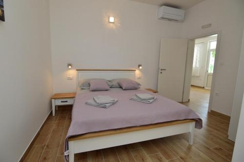 Ένα ή περισσότερα κρεβάτια σε δωμάτιο στο Holiday Home Kevin