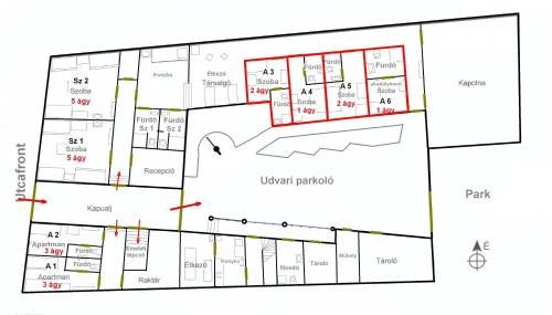 a floor plan of a building with red lines at Ciszterci Szállás Pécs in Pécs