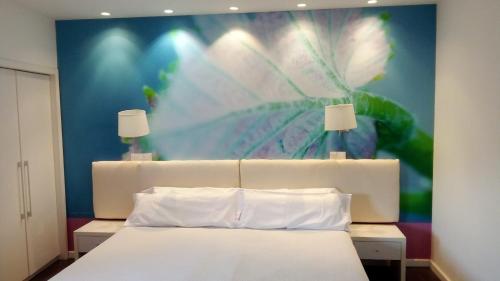Кровать или кровати в номере Hotel Villa Sonsierra