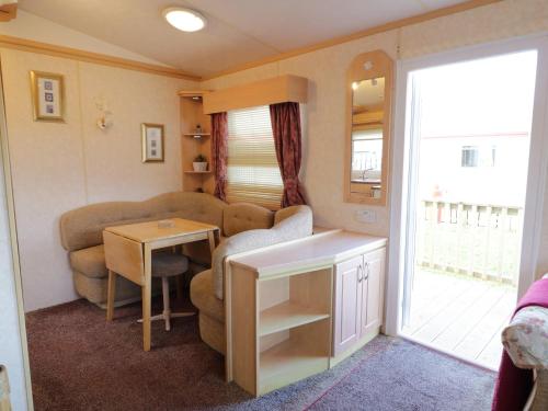 Χώρος καθιστικού στο Meric Stone Holiday Lets Caravan 2