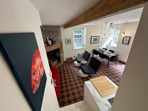 an aerial view of a living room with a living room at Bridge Cottage Upper Malone in Belfast